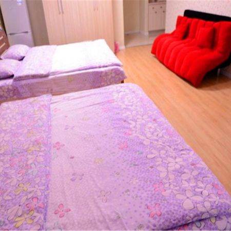 Green Express Apartment Harbin West Railway Station Bagian luar foto